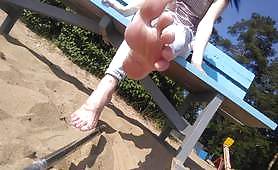 I play foot fetish on a public beach with the sand with my sweet legs. feet need to lick GinnaGg